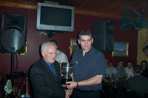 Brian Nugent (right) receives the Club Man of the Year award from Joe Jordan