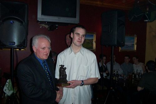Kieran McNamee (right) receives the 'B' Player of the Year award from Joe Jordan