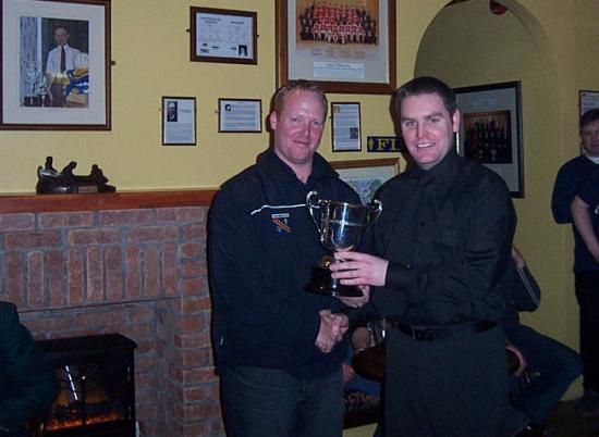 Kevin Corr receives the Club Person of the Year award from Brendan Tierney