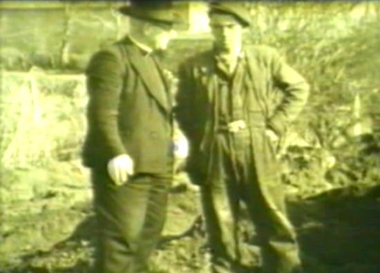 Fr. William McKnight in conversation with one of the workers.