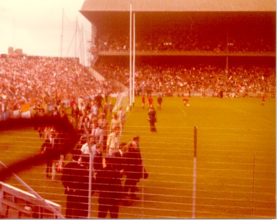 The Armagh team make their way into the changing rooms before their 1977 final against Dublin. In the background the Down minors are on their way to winning the 1977 All-Ireland minor title