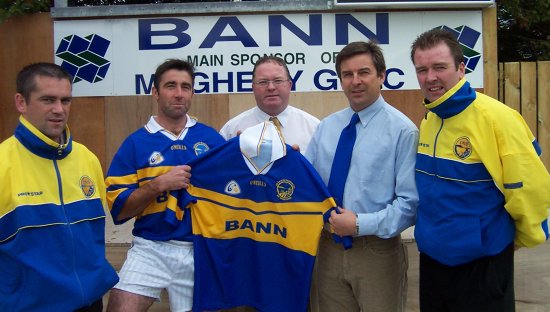 Brian Fox of Bann presents a new kit to Maghery captain Eamon Toye ahead of the 2003 Armagh Intermediate Final. From left, Jim Robinson (manager), Eamon Toye (captain), John Robinson (chairman), Brian Fox, Joe Fox (manager)