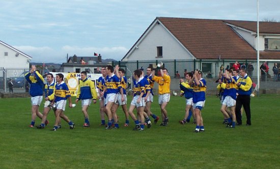 The Maghery team on a lap of honour after defeating Madden in the 2003 final of the Armagh intermediate football championship.