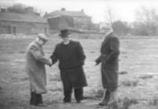 Fr. William McKnight and Mr Aloysius Mackle agree the purchase of Maghery Football field with Tommy Mackle in 1955